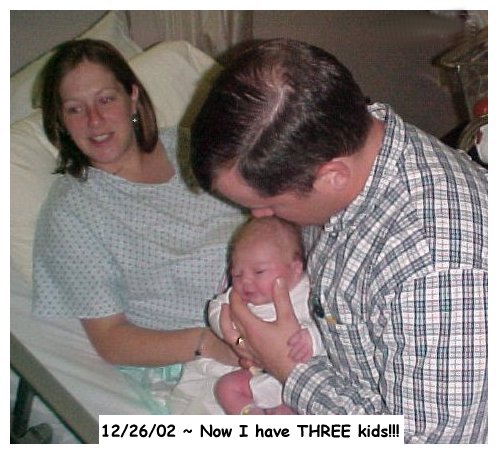 Abby and her parents 3.5 hours old